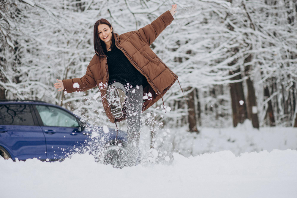 dojazd elektromobilu žena auto zima